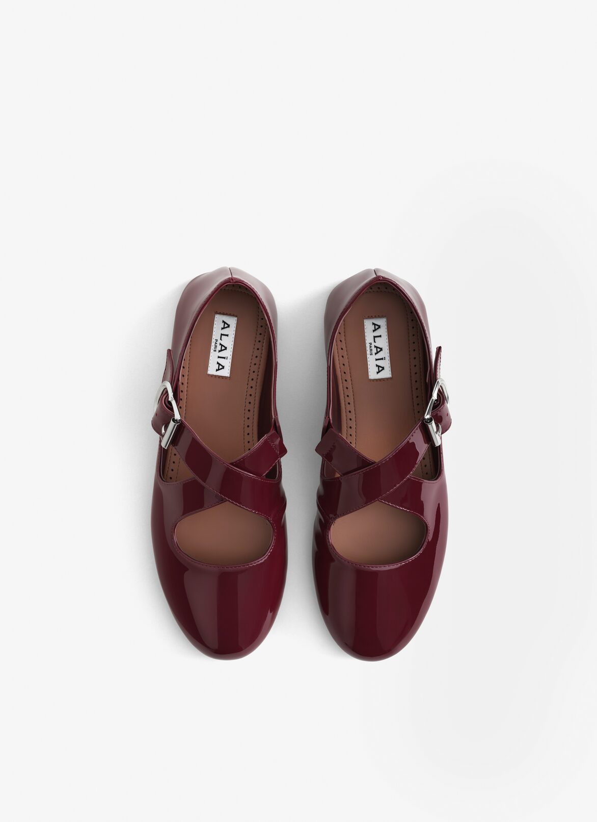 BALLERINES CRISS CROSS EN CUIR VERNI  ALAÏA ROUGE GRENAT BALLERINES CRISS CROSS EN CUIR VERNI